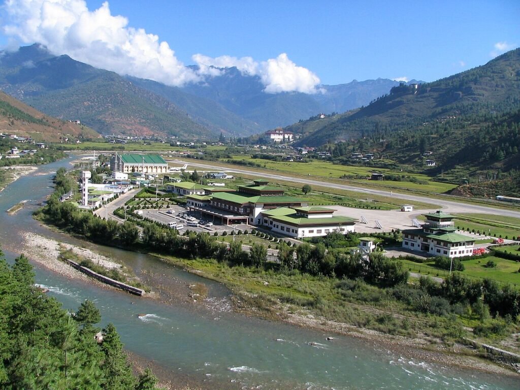 Paro International Airport surrounded by Himalayan mountains in Bhutan