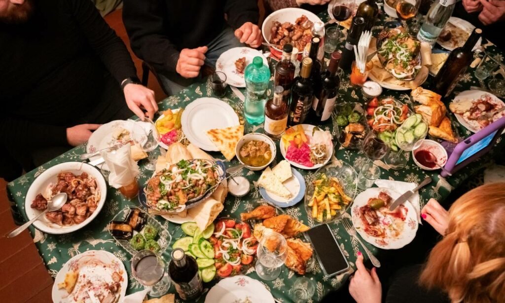 Georgian supra feast with traditional food and wine