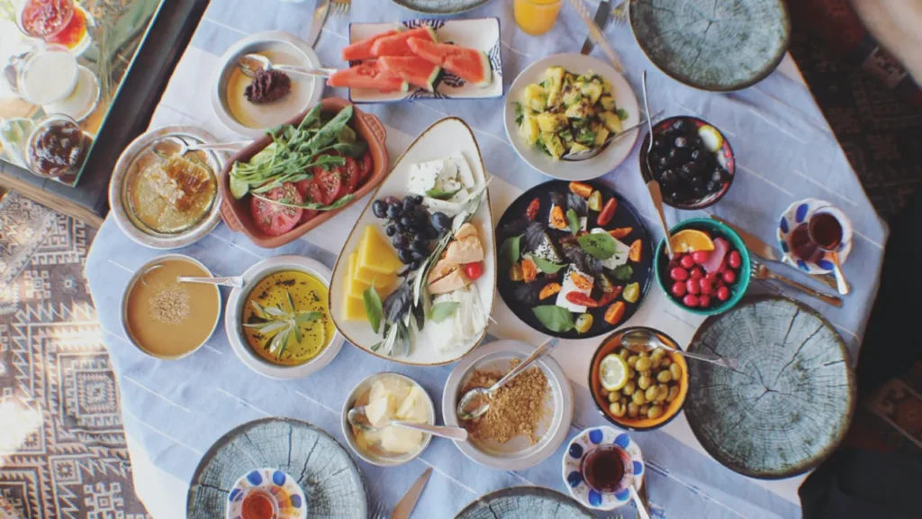 Traditional Turkish kahvalti breakfast spread with cheese, olives, eggs and tea