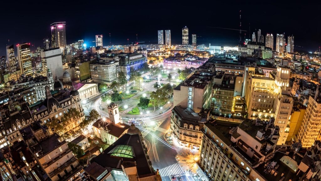 Buenos Aires cityscape aerial view at night, illuminated skyline