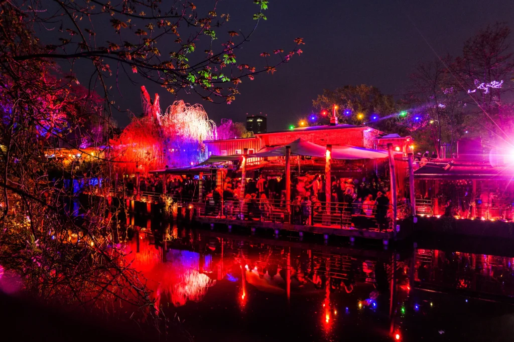 Club der Visionare riverside bar lit up at night, Berlin outdoor nightlife