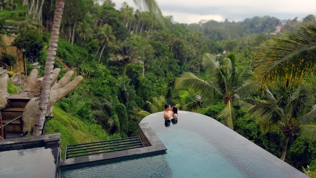 Couple relaxing beside a private pool in Ubud, Bali