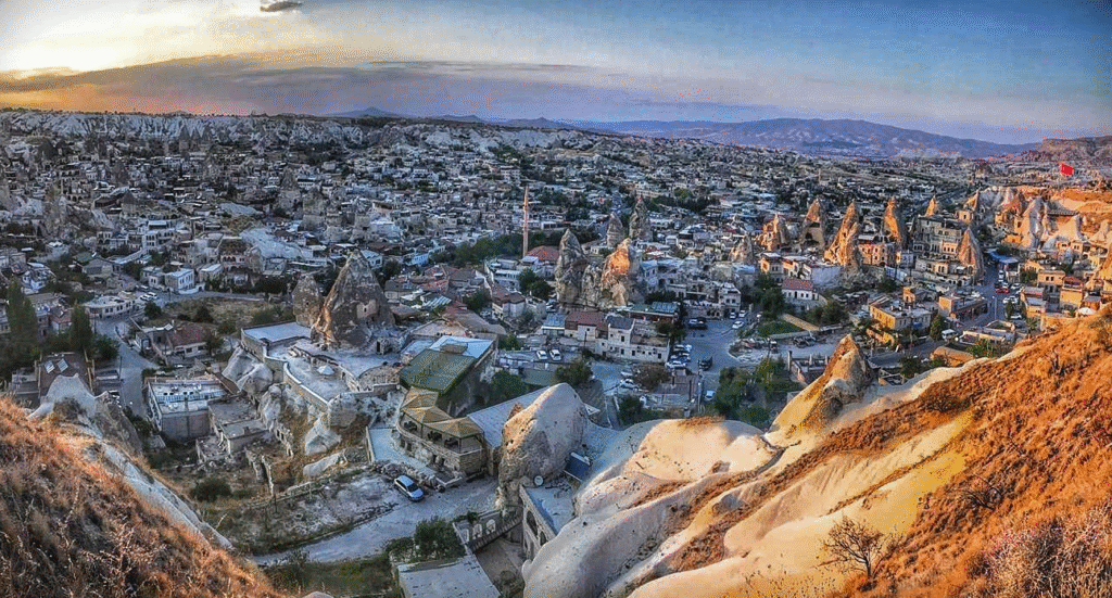 Göreme village panorama with cave hotels and fairy chimneys, Cappadocia Turkey
