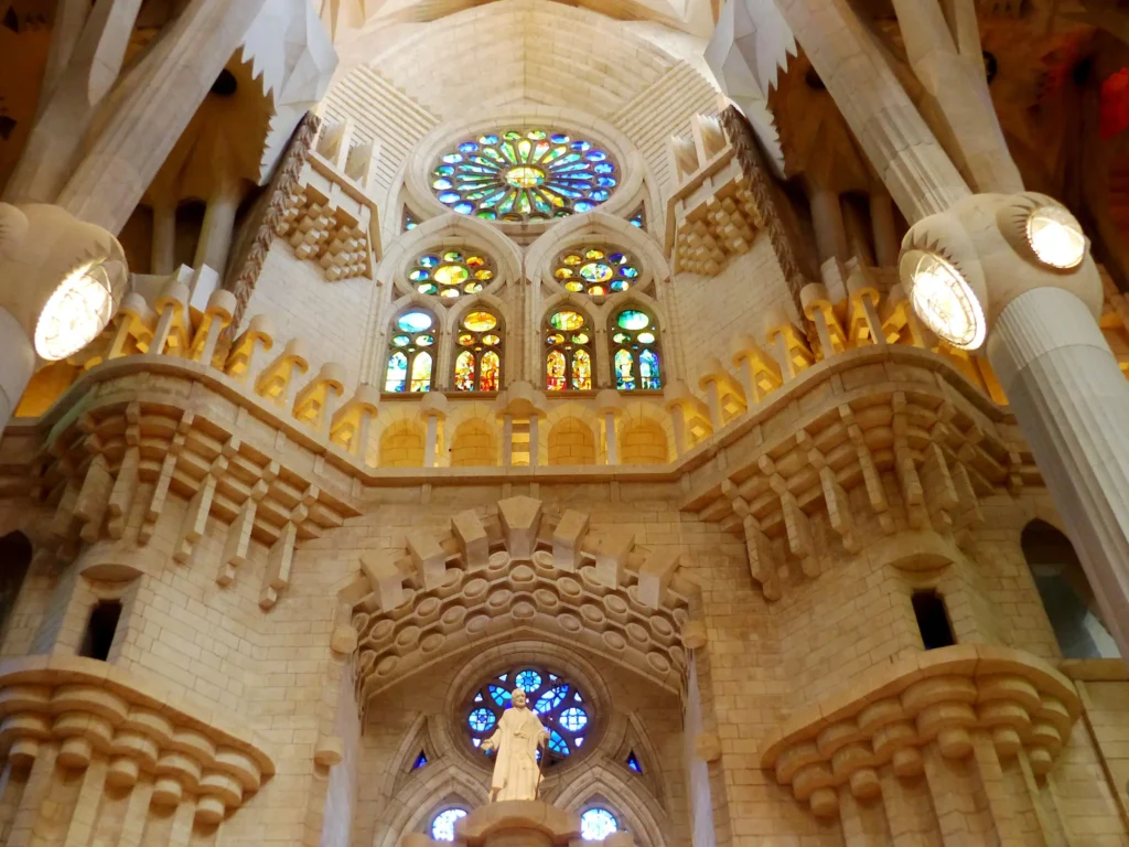 Interior columns and stained glass at Sagrada Família in Barcelona