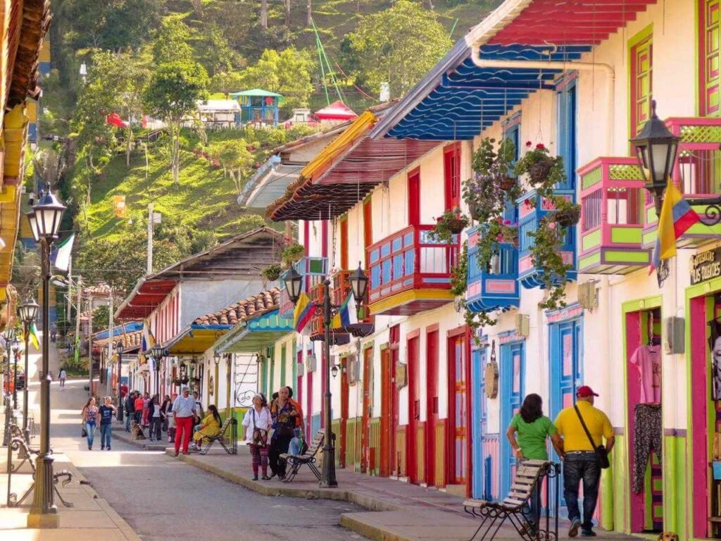 Colorful colonial street in Salento, Colombia coffee region – Calle Real lined with painted balconied buildings