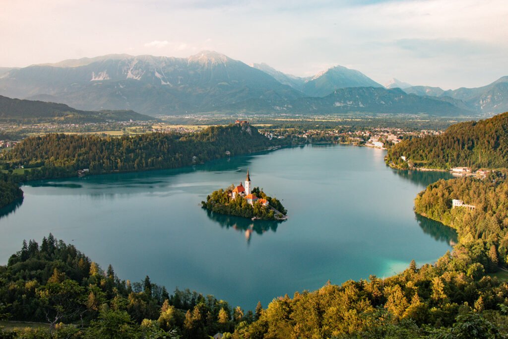 Lake Bled with island church and Julian Alps in Slovenia