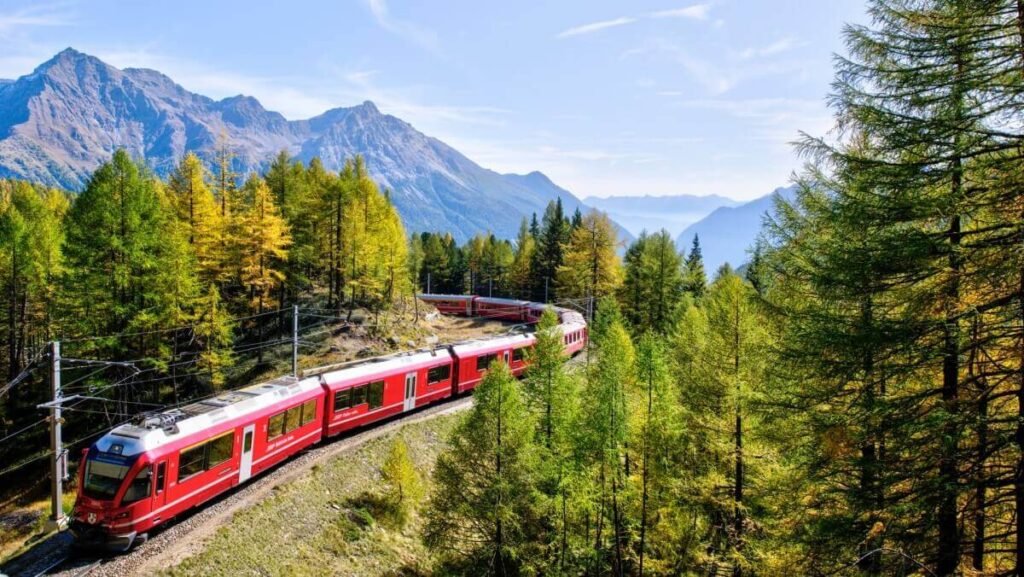 Passenger train traveling through a landscape as a lower-carbon alternative to flying