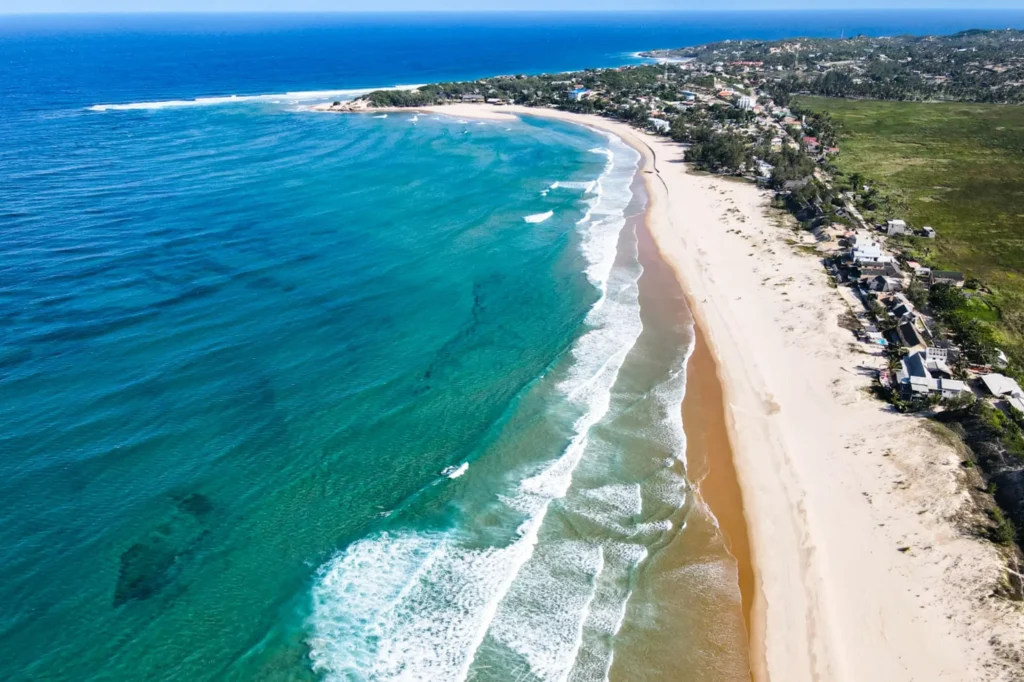 Tofo Beach in Mozambique with traditional dhows and turquoise water