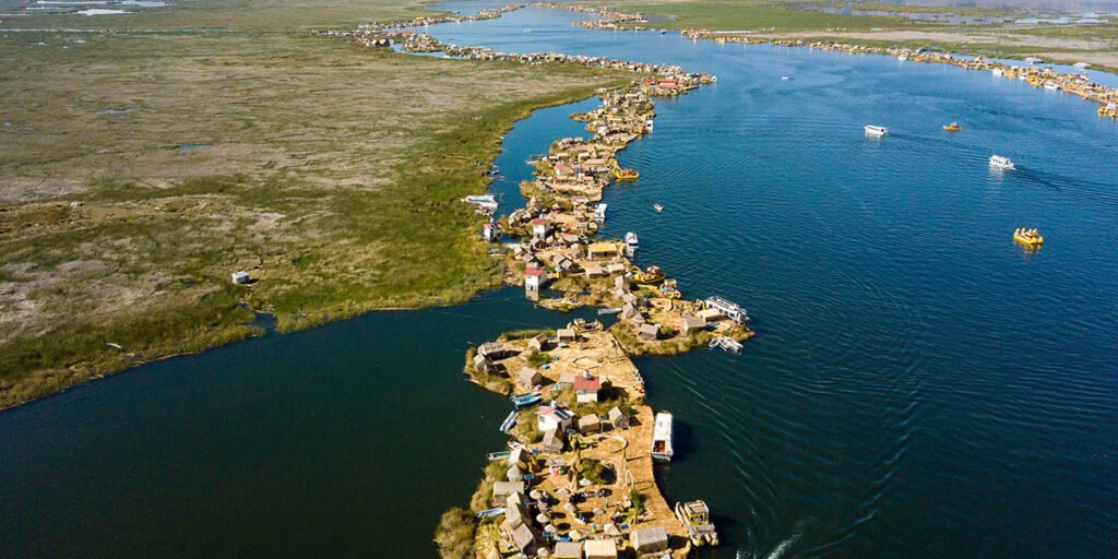 Traditional reed homes on the Uros floating islands of Lake Titicaca